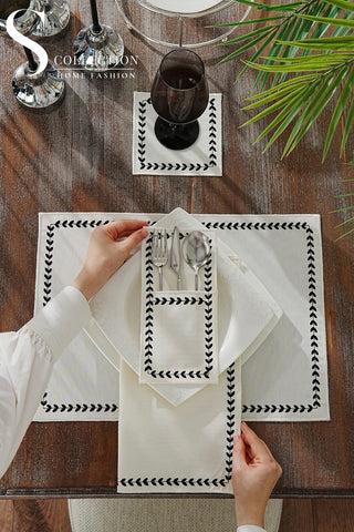 Leafy Allure Cornered Black Embroidered Placemat Set, 24 Pieces for 6